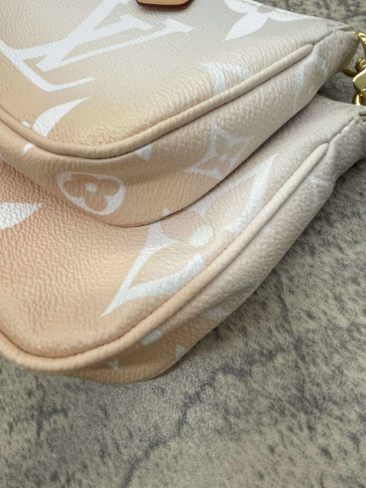 LOUIS VUITTON Multi Pochette Gradient Pink Giant Monogram Bag. RANK A